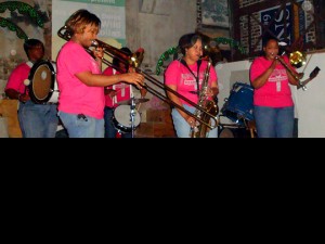 The Pinettes Brass Band performs in between Indian practice sets at Handa Wanda’s.