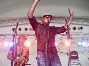 Big Sam of Big Sam's of Funk Nation at Jazz Fest. Photo by Todd Geasland