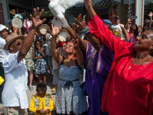 A dove was released in memory of past community members during the Mardi Gras Indian Hall of Fame Week at the Ashe Cultural Arts Center in 2015 [Photo by Ryan Hodgson-Rigsbee]