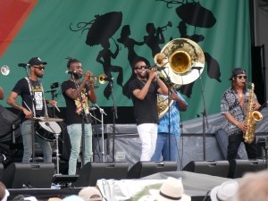 Trombone Shorty and New Breed Brass Band at Jazz Fest 2024 [Photo by Louis Crispino]