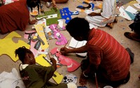 photo of youth creating artwork at YA/YA
